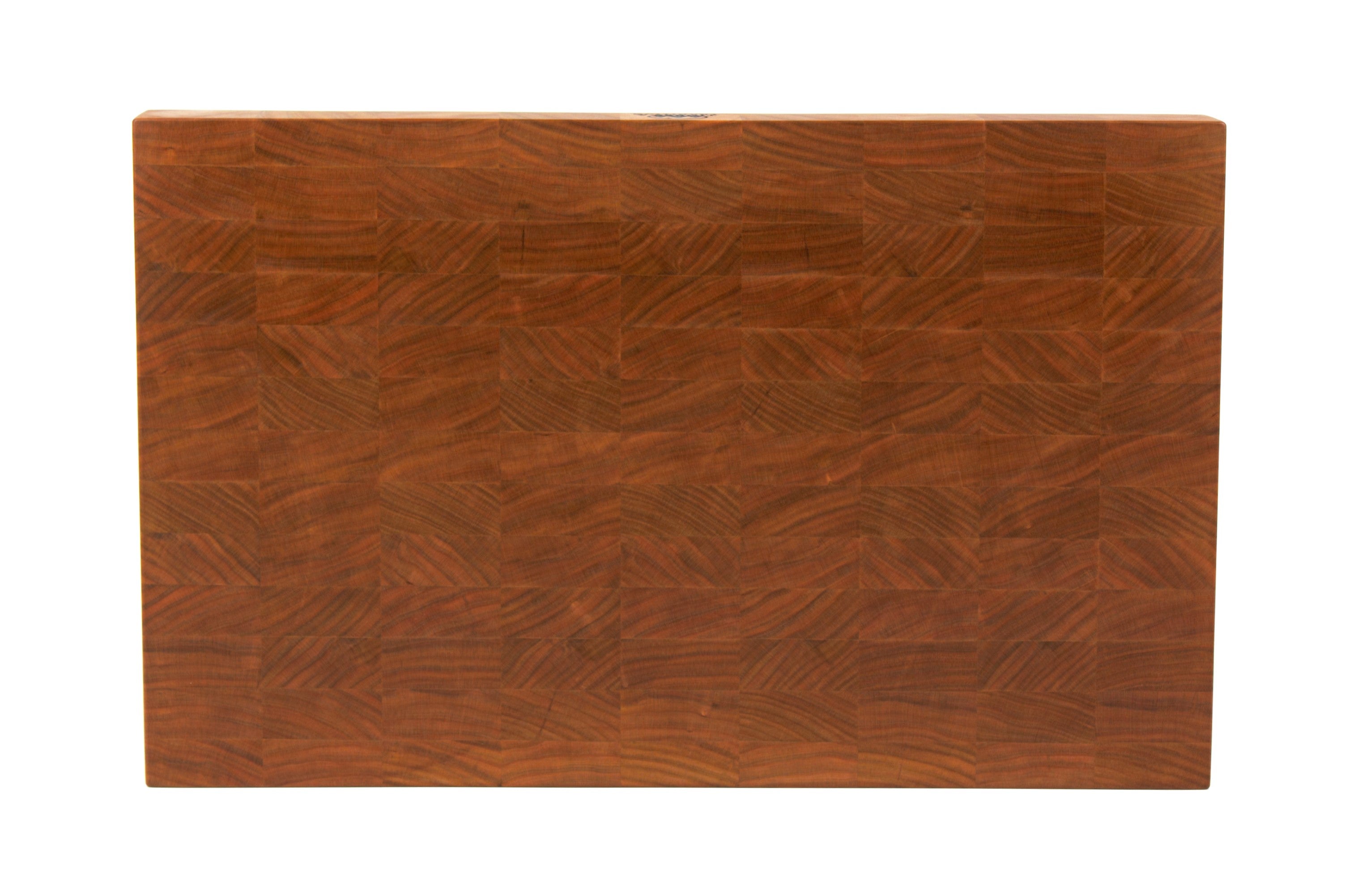 Cherry wood end grain cutting board with rich warm wood tones. Displaying a view of the cutting surface.