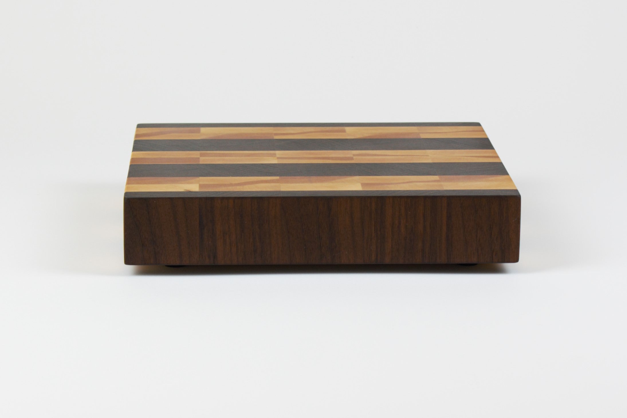 Luxurious Black Walnut and Maple cutting board, rear view.