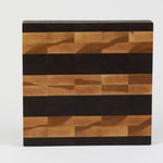 Luxurious Black Walnut and Maple cutting board, top view.