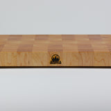 Classic Hard Maple cutting board with golden hues. The Timber & Tradition logo is burned into the center front, this is the front center view.