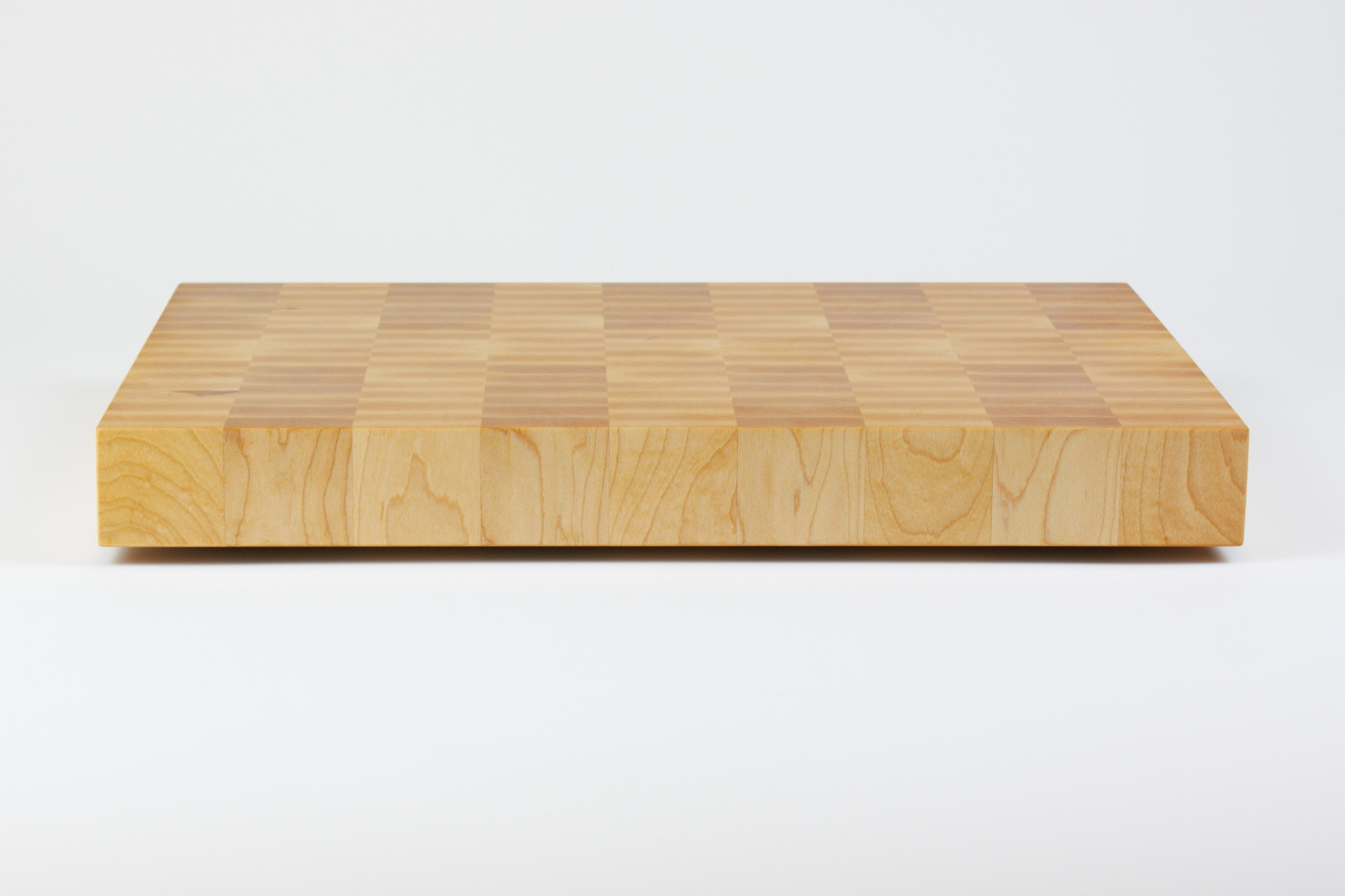 Classic Hard Maple cutting board with golden hues, this is the rear view.