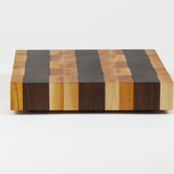 Luxurious Maple and Black Walnut cutting board, side view.