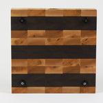 Luxurious Maple and Black Walnut cutting board, bottom view, displaying four cutting board feet.