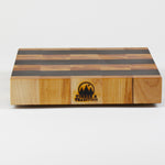 Luxurious Maple and Black Walnut cutting board, front view.