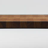 End grain cutting board made of rustic Hard Maple and accented with Tigerwood and Black Walnut, rear view.